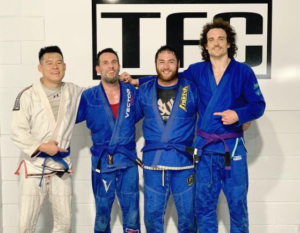 Ben Johnston with 3 Brazilian Jiu Jitsu students in Brisbane