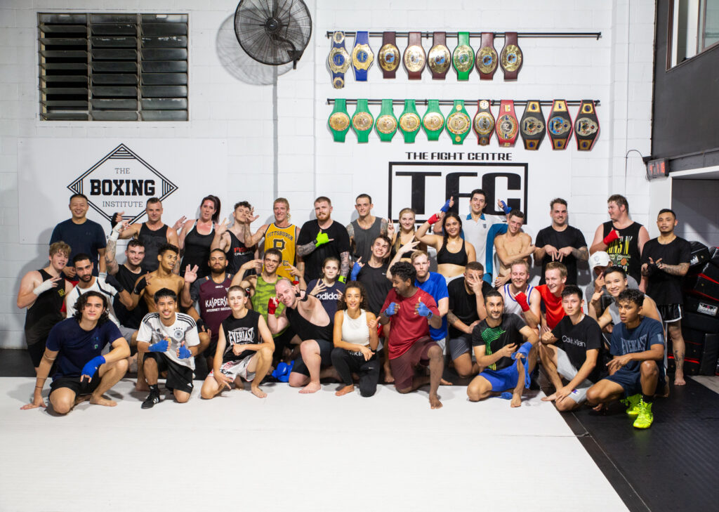 A group shot of people learning martial arts at The Fight Centre