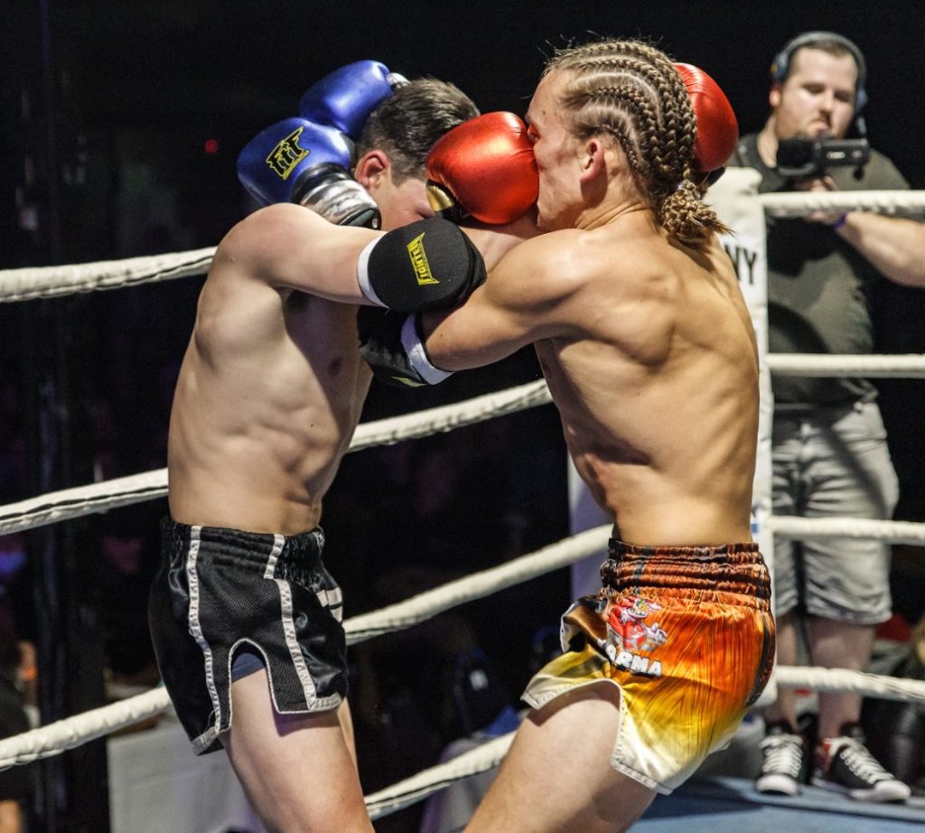 two fighters in a Muay Thai clinch